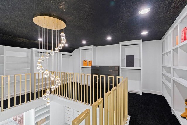 5402 Bonanza Dr, Corpus Christi, TX 78414 - hallway featuring an upstairs landing, recessed lighting, a chandelier, carpet flooring, and baseboards