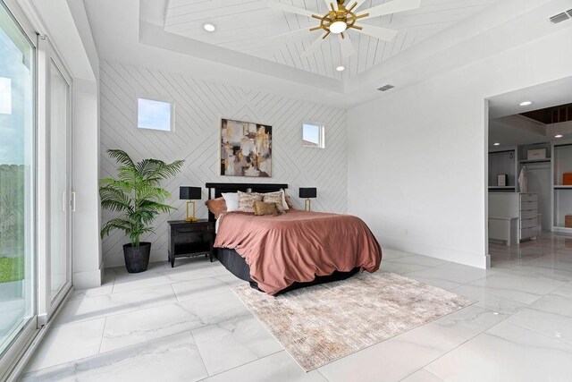 5402 Bonanza Dr, Corpus Christi, TX 78414 - bedroom with marble finish flooring, a tray ceiling, baseboards, and recessed lighting
