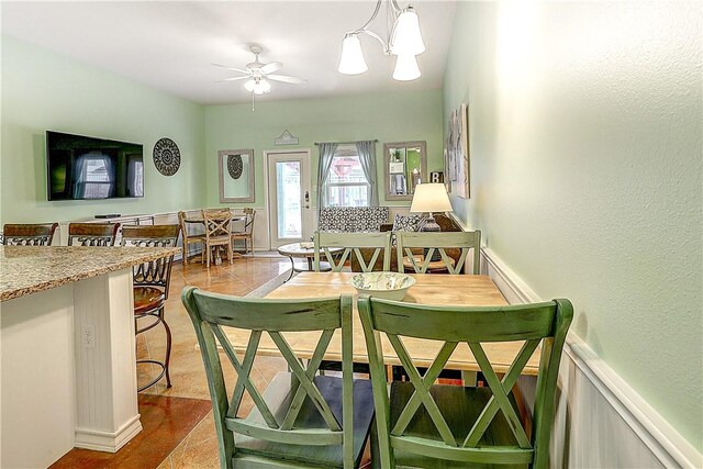 dining room featuring ceiling fan