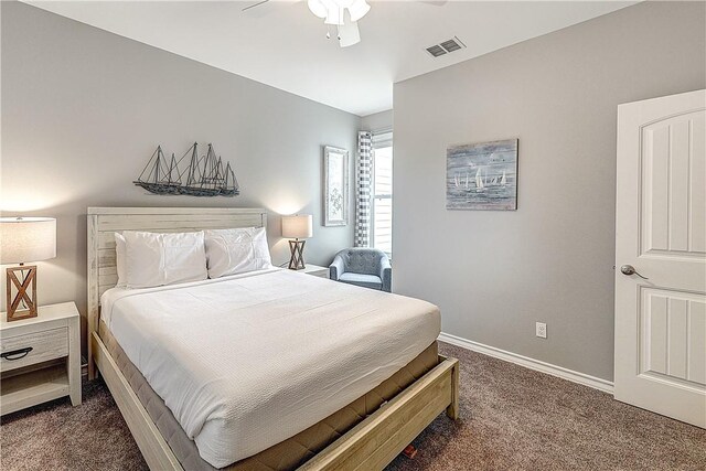 bedroom with ceiling fan, visible vents, baseboards, and dark colored carpet