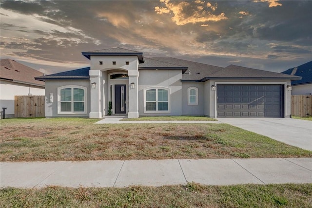 104 Emerald St, Portland, TX 78374 - mediterranean / spanish home with a garage, stucco siding, and concrete driveway