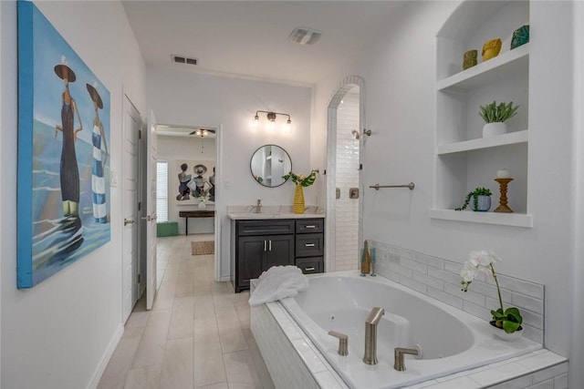 104 Emerald St, Portland, TX 78374 - bathroom featuring vanity, a whirlpool tub, and built in features