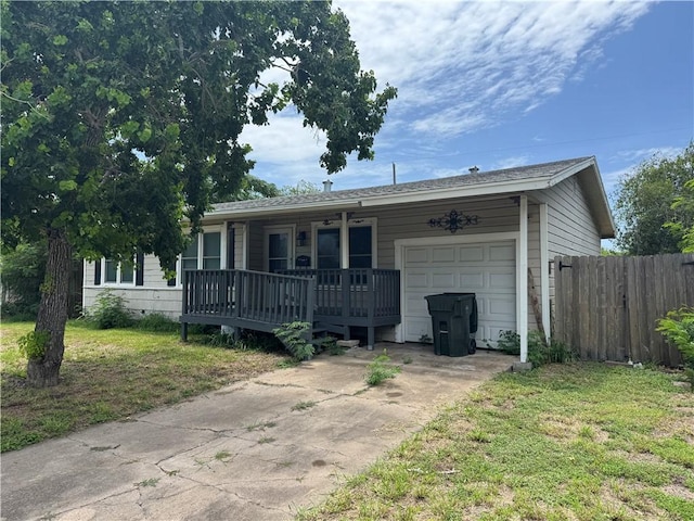 913 Clare Dr, Corpus Christi, TX 78412 - ranch-style house with covered porch, a garage, and concrete driveway