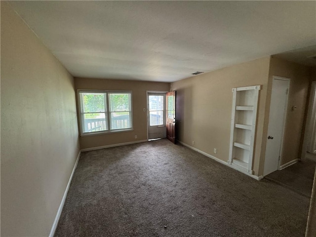 913 Clare Dr, Corpus Christi, TX 78412 - unfurnished room with carpet and built in features