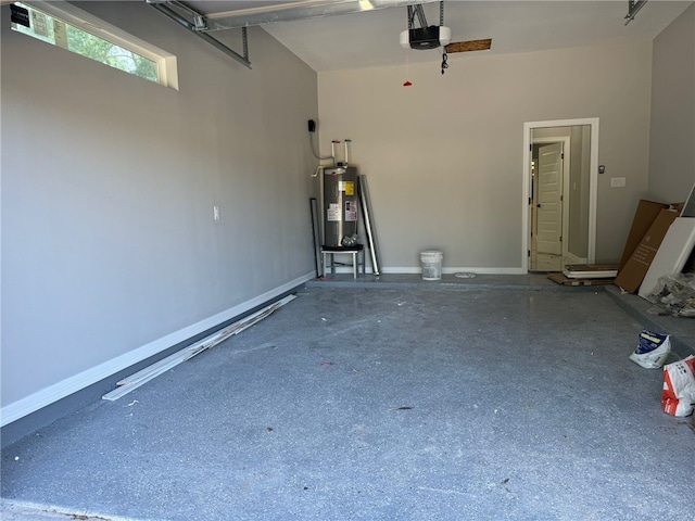 garage with electric water heater and a garage door opener