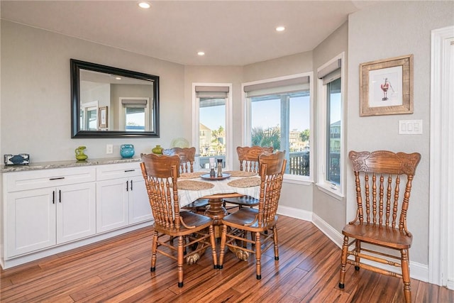 dining area with wood-type flooring