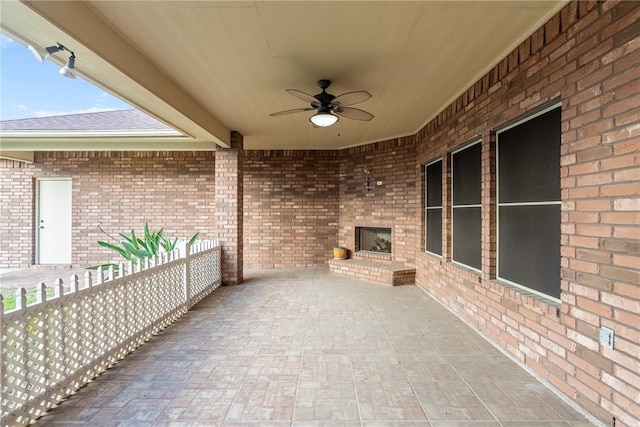 view of patio / terrace featuring ceiling fan