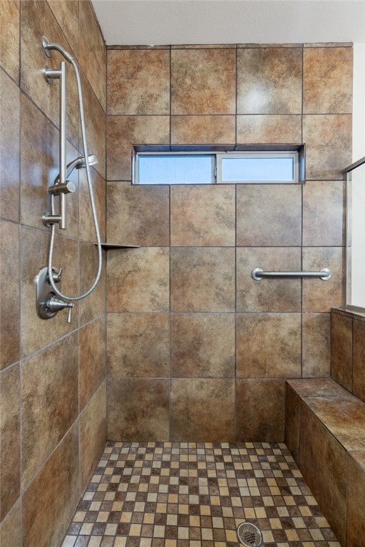 bathroom featuring tiled shower