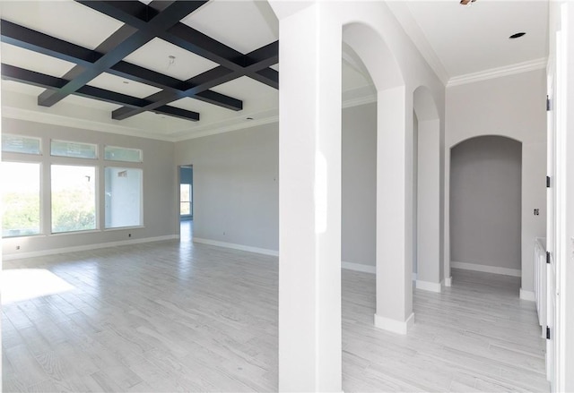 4033 Ranch Lake Dr, Corpus Christi, TX 78413 - spare room featuring arched walkways, beamed ceiling, light wood-style floors, coffered ceiling, and ornamental molding