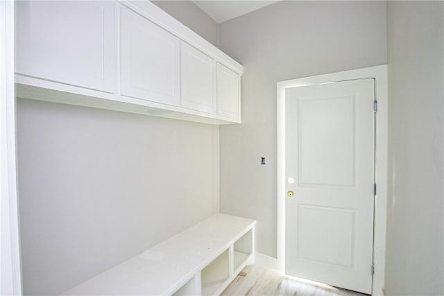 4033 Ranch Lake Dr, Corpus Christi, TX 78413 - mudroom with baseboards and light wood-style flooring