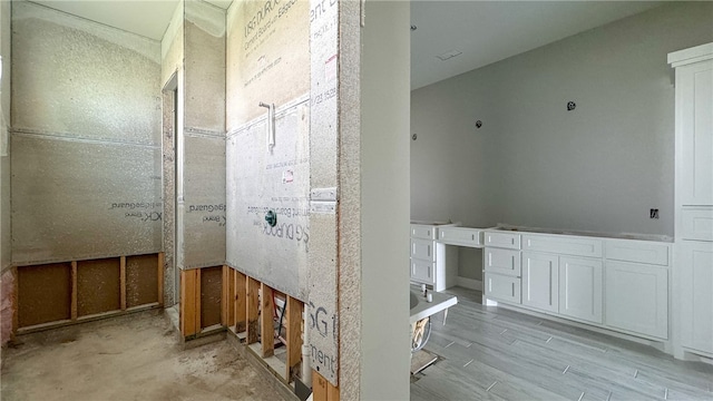 bathroom featuring hardwood / wood-style flooring