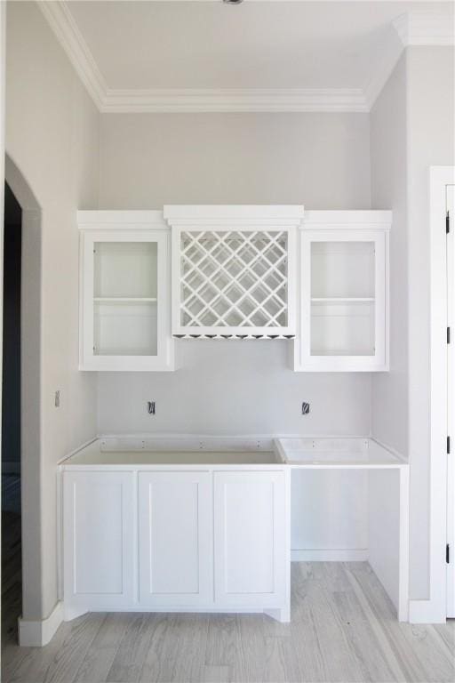 4033 Ranch Lake Dr, Corpus Christi, TX 78413 - indoor dry bar featuring ornamental molding and light wood-style flooring