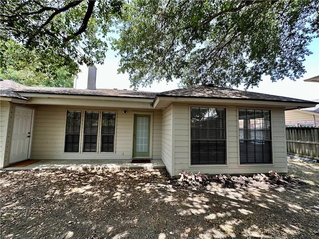 6313 Ramsgate Cir, Corpus Christi, TX 78414 - rear view of property featuring a chimney