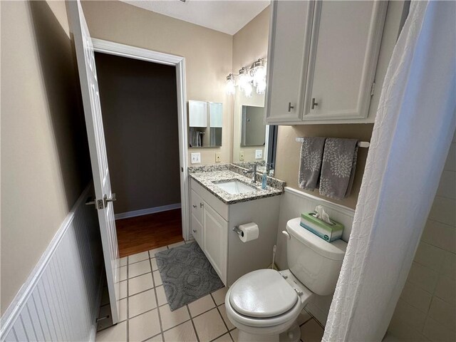 6313 Ramsgate Cir, Corpus Christi, TX 78414 - full bathroom featuring toilet, tile patterned flooring, and vanity