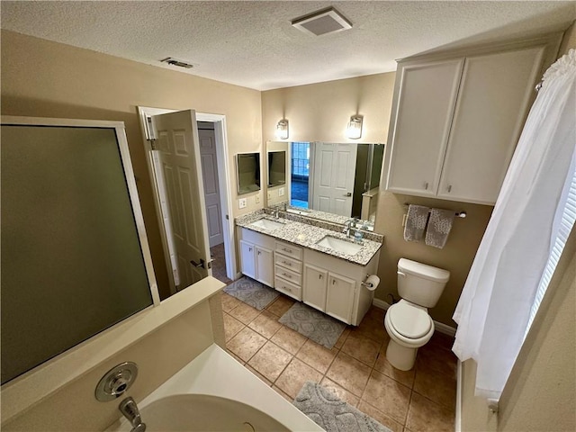 6313 Ramsgate Cir, Corpus Christi, TX 78414 - bathroom with a bath, double vanity, tile patterned floors, curtained shower, and toilet