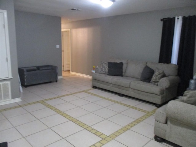 living room with light tile patterned floors