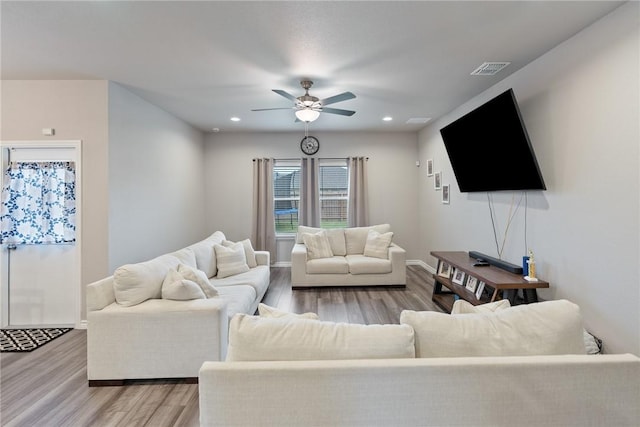 7221 Tristan Dr, Corpus Christi, TX 78414 - living area featuring light wood finished floors, ceiling fan, baseboards, and recessed lighting