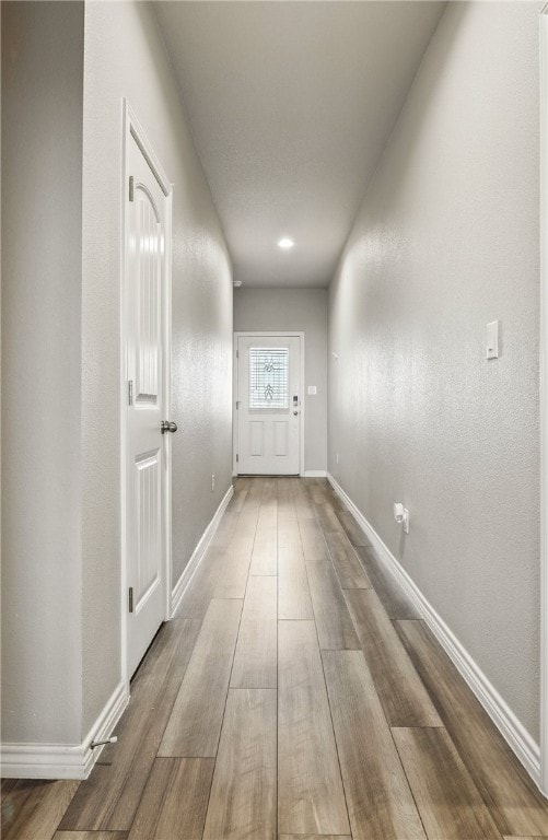 1293 Carnaby St, Corpus Christi, TX 78415 - corridor featuring wood finished floors and baseboards