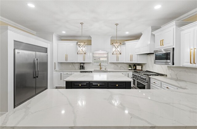 5413 King Trl, Corpus Christi, TX 78414 - kitchen featuring built in appliances, a sink, a center island, ornamental molding, and tasteful backsplash