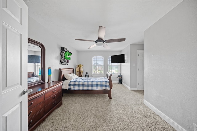 5413 King Trl, Corpus Christi, TX 78414 - bedroom with light carpet, baseboards, and ceiling fan