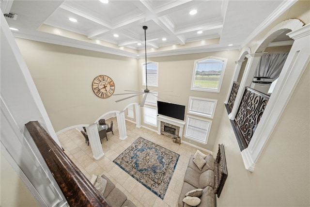 5413 King Trl, Corpus Christi, TX 78414 - tiled living area with ornate columns, coffered ceiling, beamed ceiling, a ceiling fan, and a fireplace