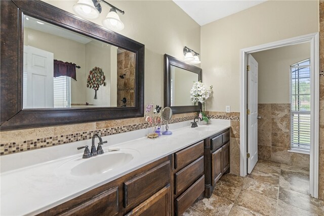 5413 King Trl, Corpus Christi, TX 78414 - bathroom featuring double vanity and tile walls