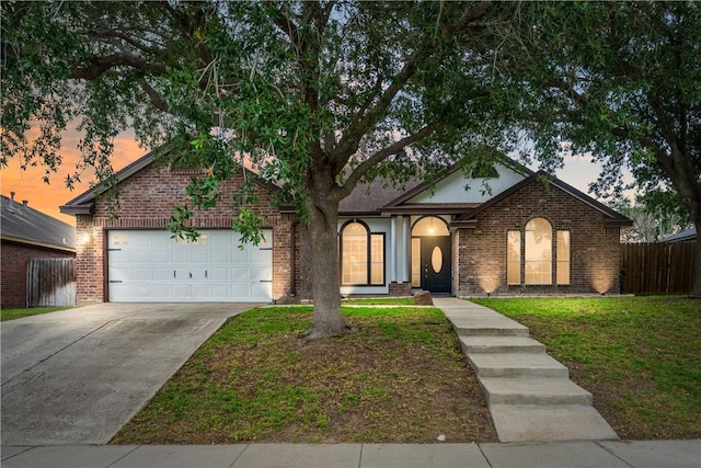 4230 Rapids Dr, Corpus Christi, TX 78410 - view of front of property with brick siding, concrete driveway, and an attached garage
