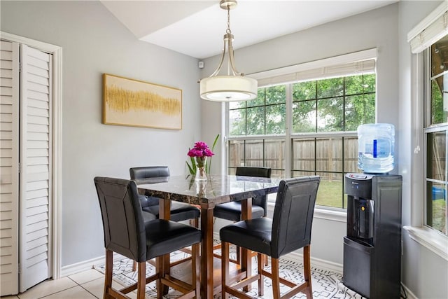 4230 Rapids Dr, Corpus Christi, TX 78410 - dining room featuring baseboards and light tile patterned flooring