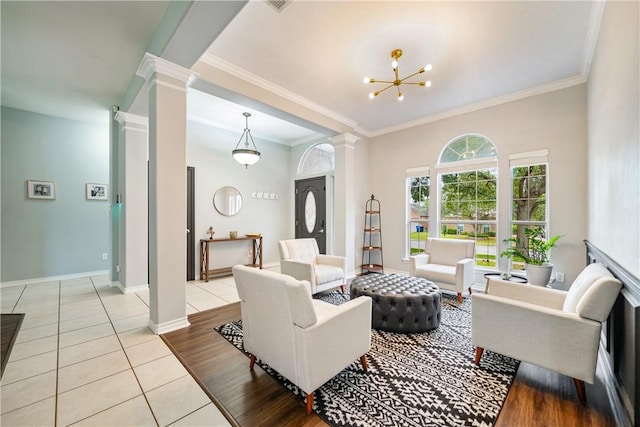 4230 Rapids Dr, Corpus Christi, TX 78410 - living room with decorative columns, light tile patterned floors, ornamental molding, baseboards, and a chandelier