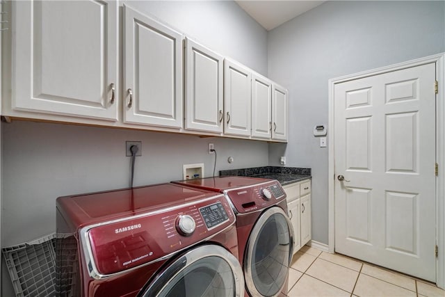 4230 Rapids Dr, Corpus Christi, TX 78410 - laundry room with washer and dryer, cabinet space, light tile patterned flooring, and baseboards