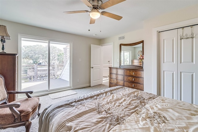 bedroom featuring visible vents, ceiling fan, access to outside, carpet flooring, and a closet