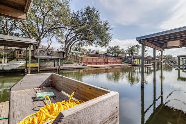 dock area featuring a water view