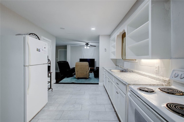 kitchen featuring white cabinets, light tile patterned floors, sink, ceiling fan, and white appliances