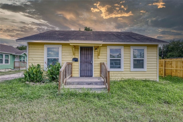 bungalow with a lawn