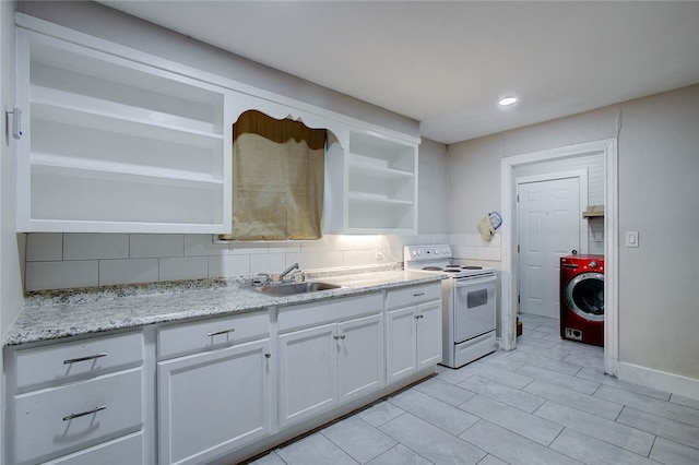 kitchen with white cabinetry, backsplash, white electric stove, washer / clothes dryer, and sink