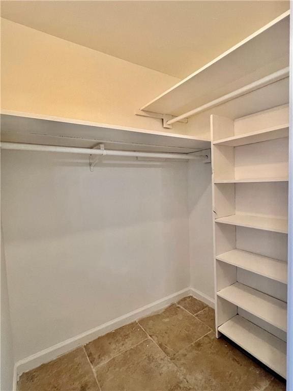 4505 Mount Vernon Dr, Corpus Christi, TX 78411 - spacious closet featuring tile patterned flooring