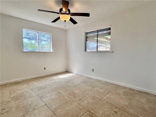 4505 Mount Vernon Dr, Corpus Christi, TX 78411 - spare room featuring baseboards and ceiling fan