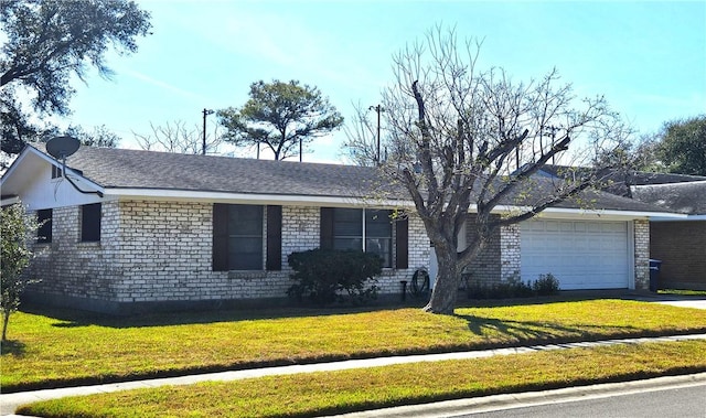 ranch-style home featuring a garage, concrete driveway, roof with shingles, and a front yard