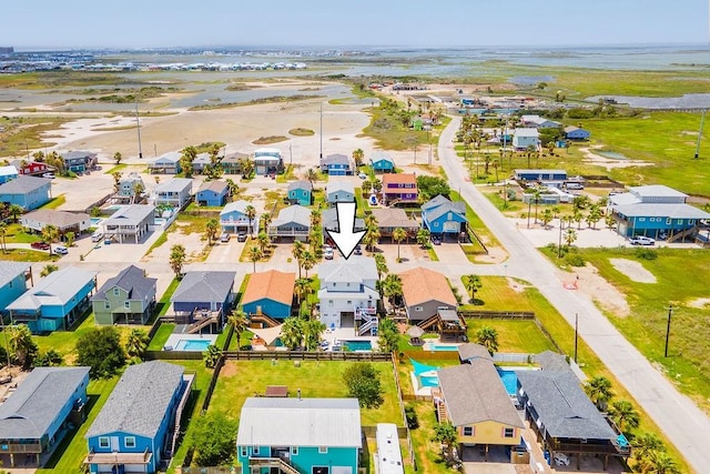 aerial view with a water view and a residential view