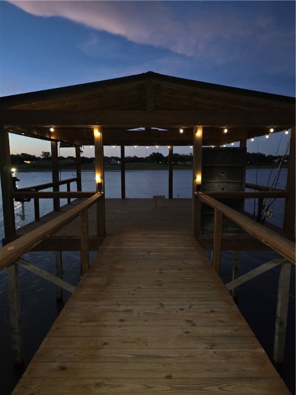 dock area featuring a water view