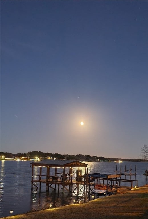 dock area featuring a water view