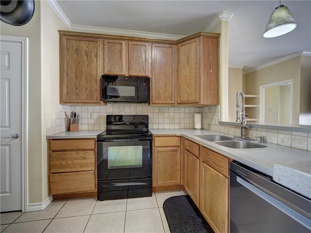 14422 Verdemar Dr, Corpus Christi, TX 78418 - kitchen with light tile patterned floors, ornamental molding, a sink, black appliances, and light countertops