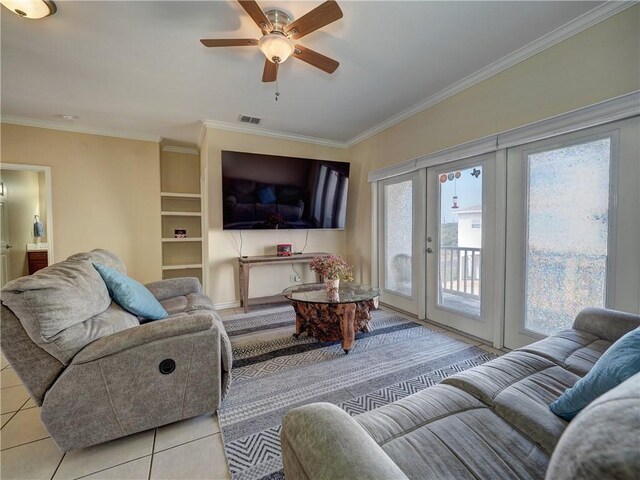 14422 Verdemar Dr, Corpus Christi, TX 78418 - tiled living room with visible vents, ceiling fan, and ornamental molding