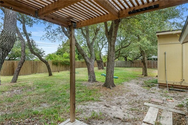 110 Wildwood, Rockport, TX 78382 - fenced backyard featuring a pergola