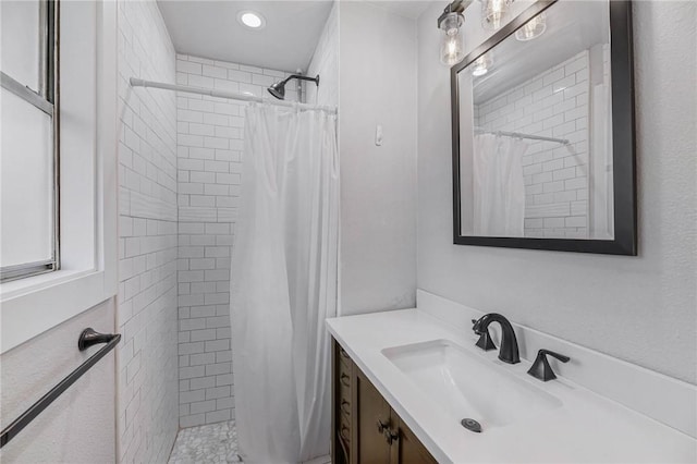 110 Wildwood, Rockport, TX 78382 - bathroom with vanity, tiled shower, and recessed lighting