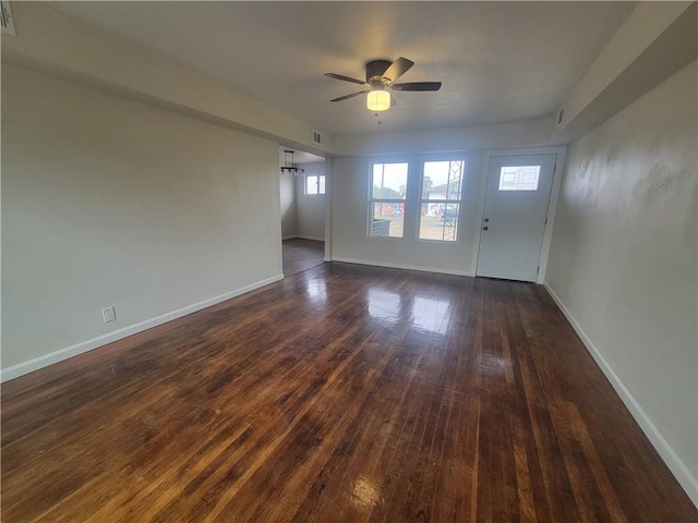 interior space featuring ceiling fan and dark wood-type flooring