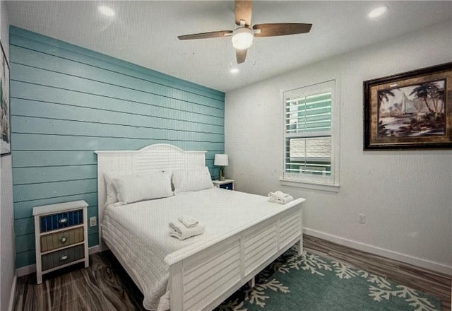 bedroom featuring dark wood-type flooring and ceiling fan