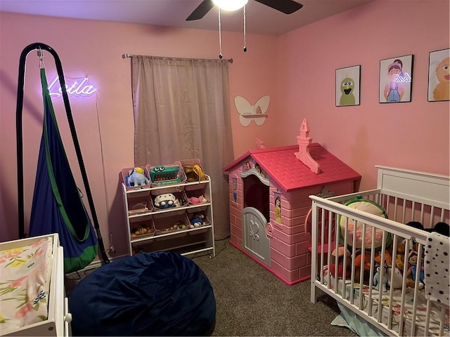 bedroom featuring dark colored carpet and ceiling fan