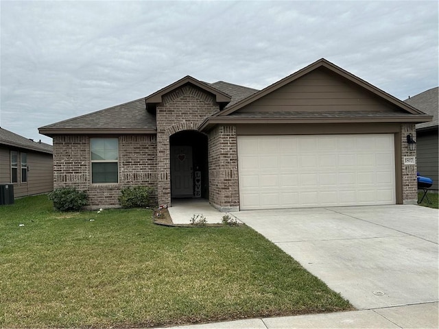 view of front of home with central AC, a garage, and a front lawn