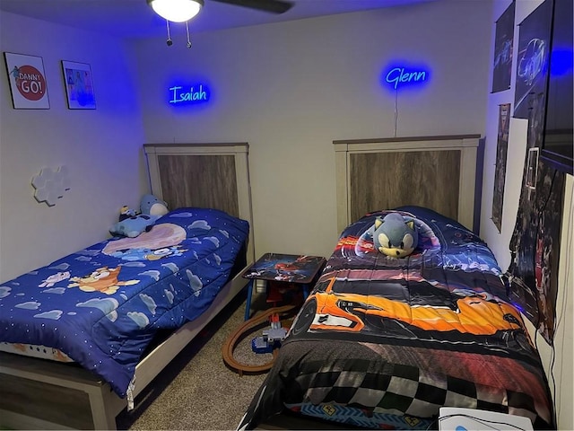 carpeted bedroom with ceiling fan